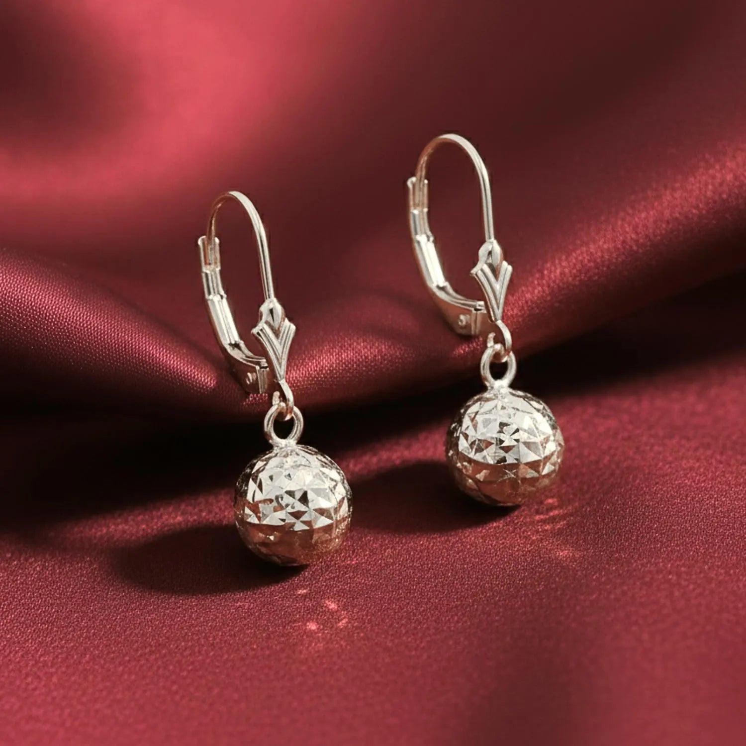 Stunning 14K White Gold Hand Engraved Diamond-Cut Round Ball Dangle Earrings with Secure French Leverbacks.