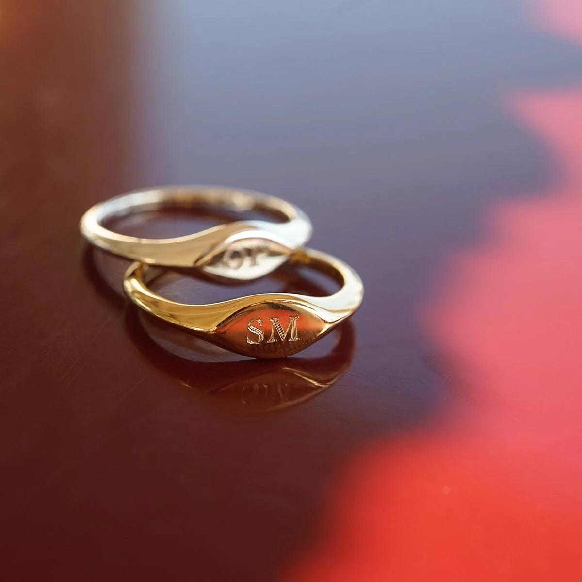 Elevate Your Style with the Estée Lalonde 18Ct Gold Plated Mini Signet Ring.