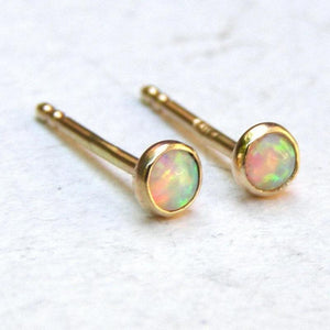 Dazzling 14K Yellow Gold Opal Stud Earrings - Adorable 3mm White Opal for Everyday Elegance and Special Occasions.