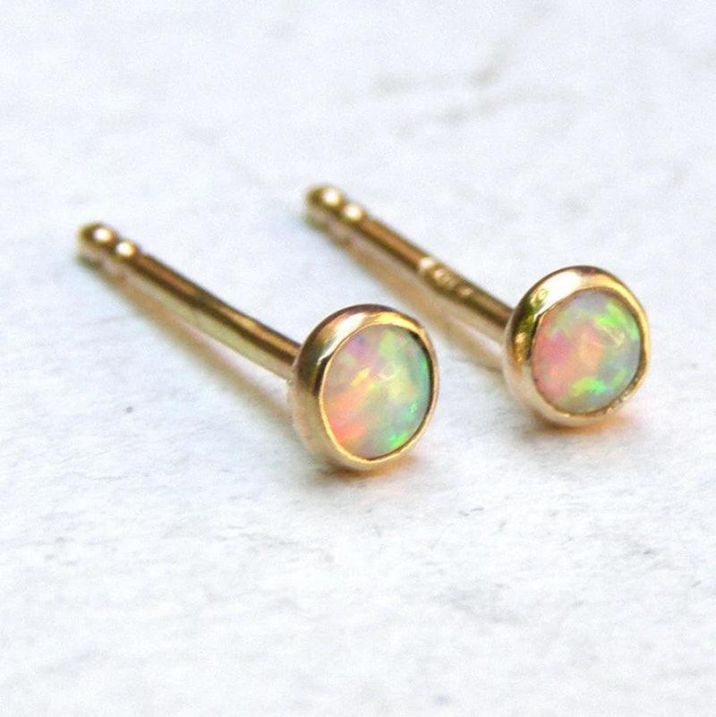 Dazzling 14K Yellow Gold Opal Stud Earrings - Adorable 3mm White Opal for Everyday Elegance and Special Occasions.
