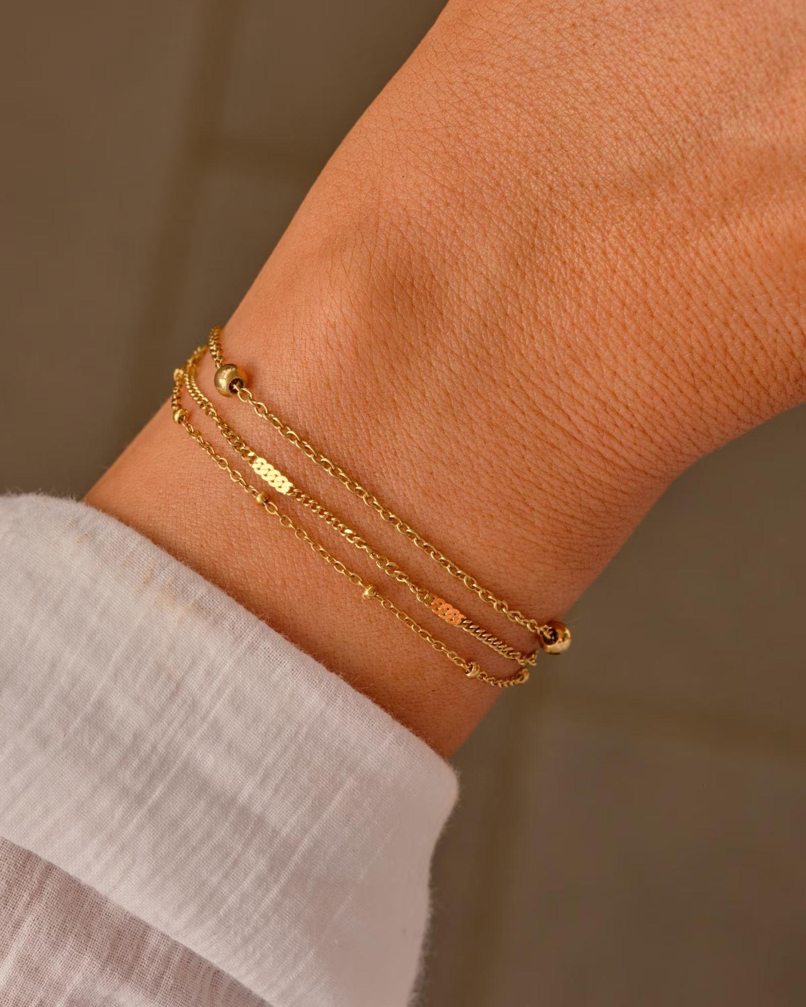 Elegant Waterproof Gold Stainless Steel Layered Bracelet - Dainty Stackable Design for Women.