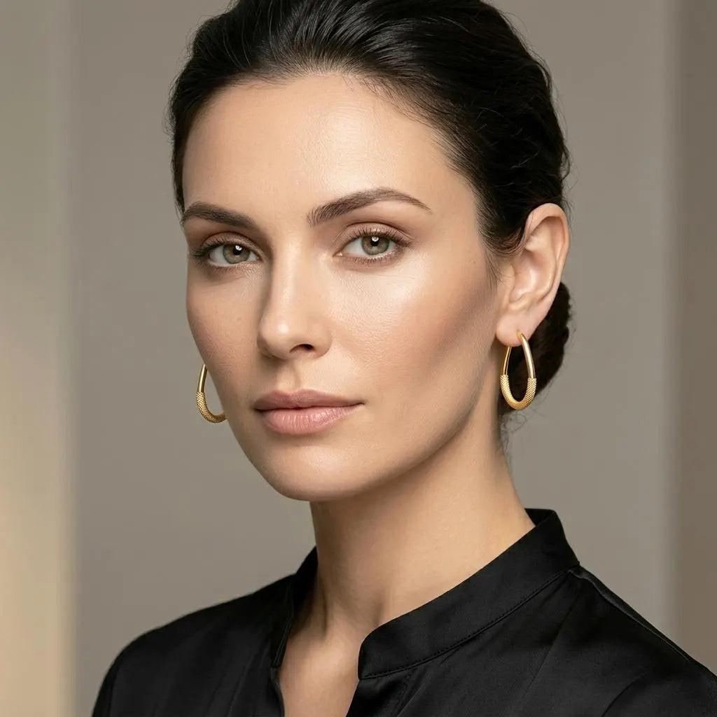 Elegant 10K Yellow Gold Textured Oval Hoop Earrings - Timeless Everyday Style.
