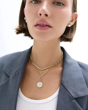 Radiant Mother of Pearl Star Pendant - Elegant Celestial Jewelry.
