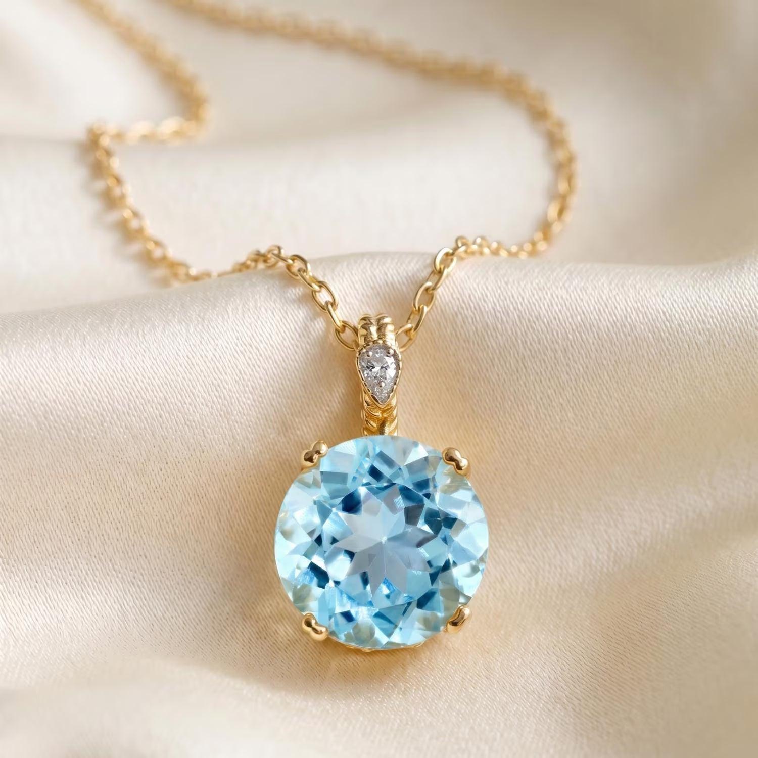 Stunning 14K Solid Gold Sky Blue Topaz & Diamond Accent Charm Pendant.