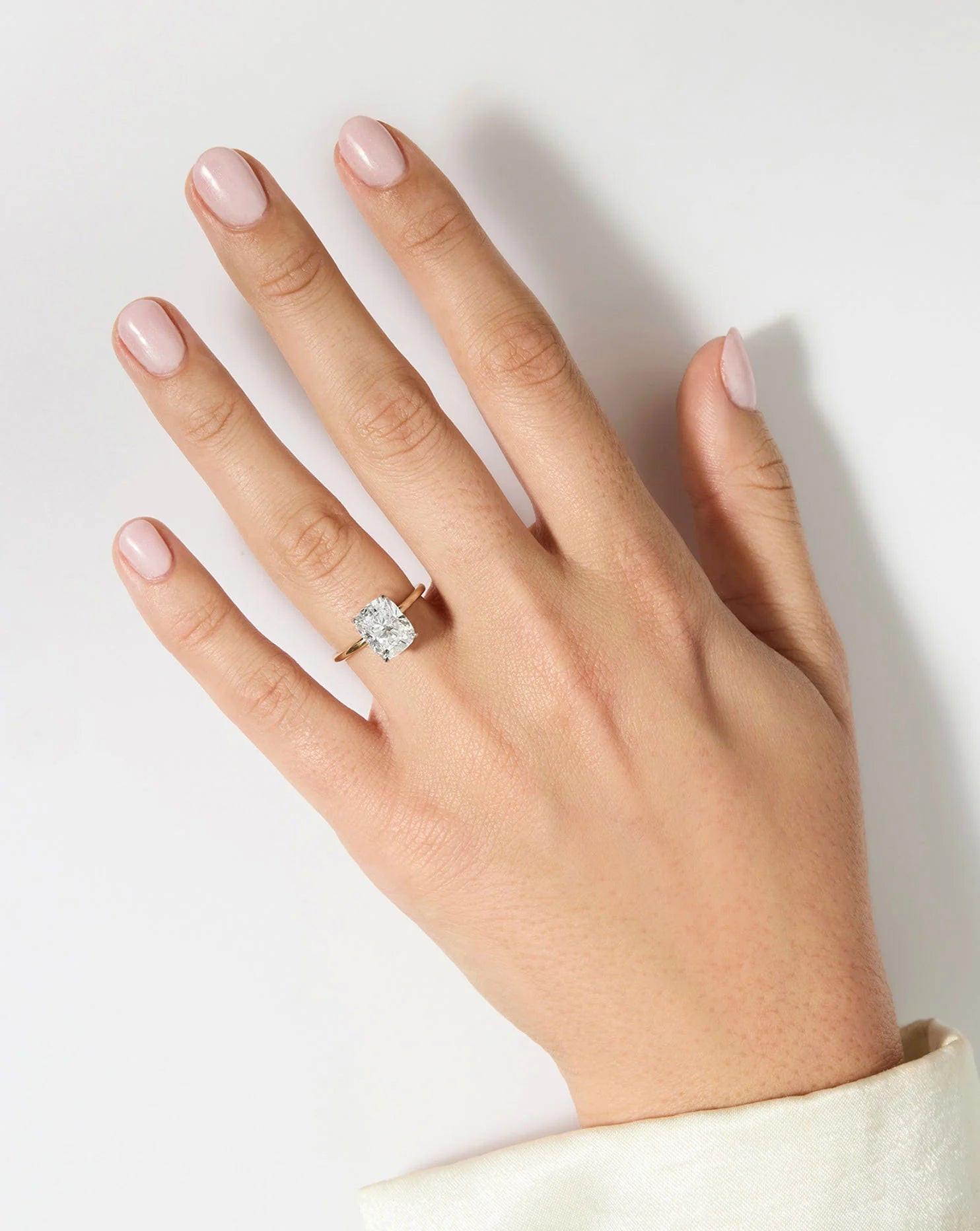 Stunning 3.15 Carat Cushion Lab Diamond with Whisper Thin® Hidden Halo Setting.