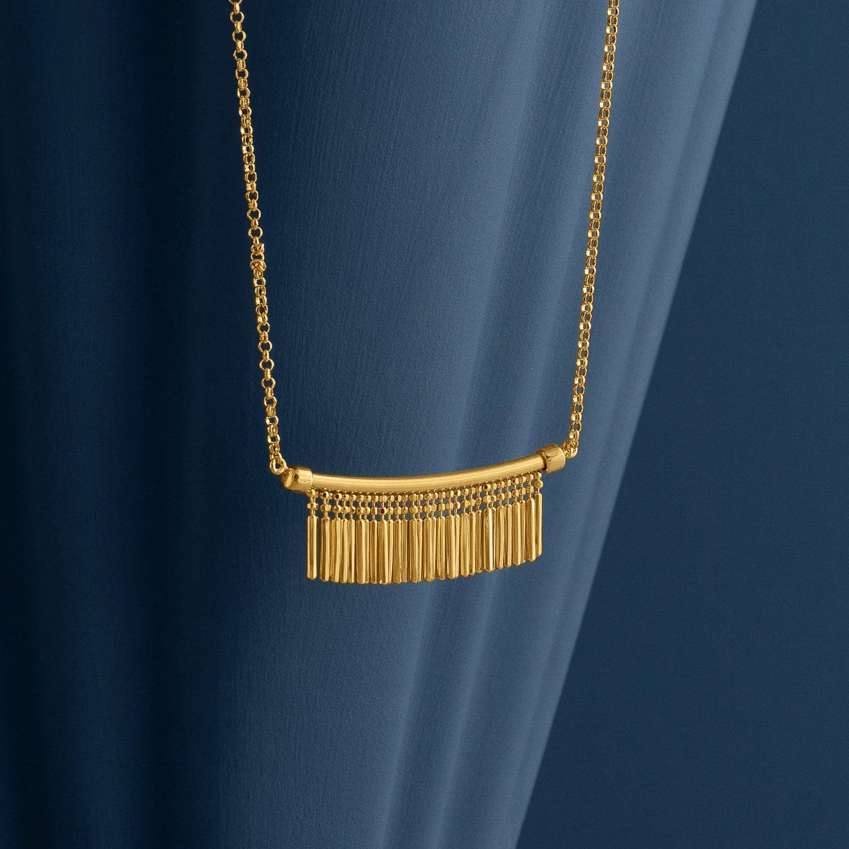 GOLD TASSEL CHARM NECKLACE