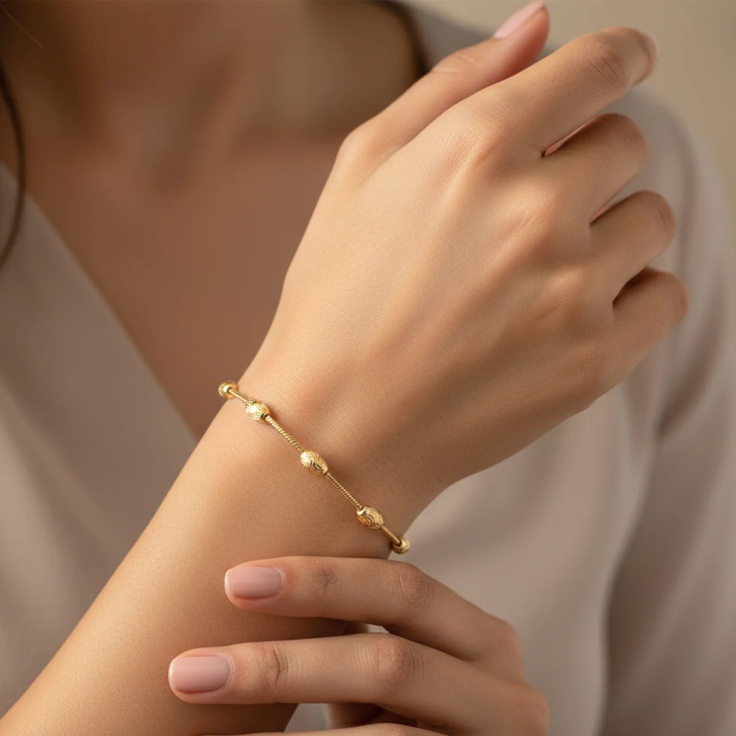 Sterling Silver Gold Plated Diamond-Cut Oval Bead Bracelet