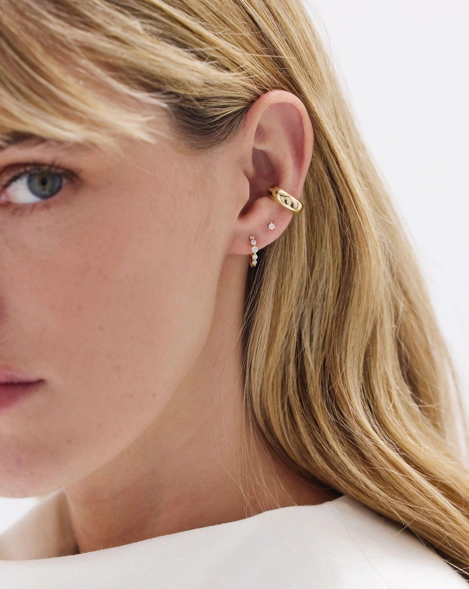 Stunning Graduated Diamond Huggie Earrings for Effortless Elegance.