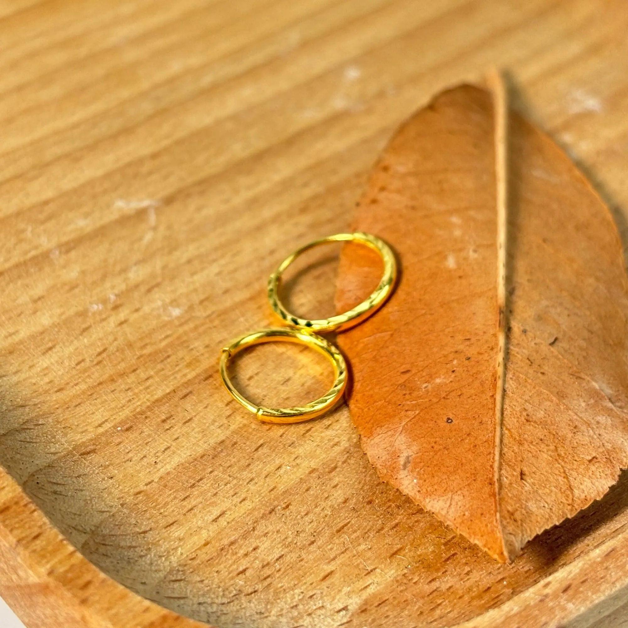 Luxurious 24K Gold Minimalist Wave Hoop Earrings for Elegant Women.