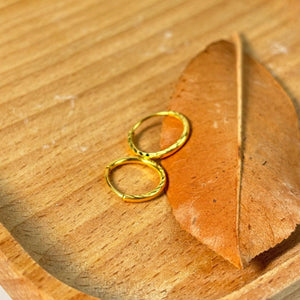 Luxurious 24K Gold Minimalist Wave Hoop Earrings for Elegant Women.