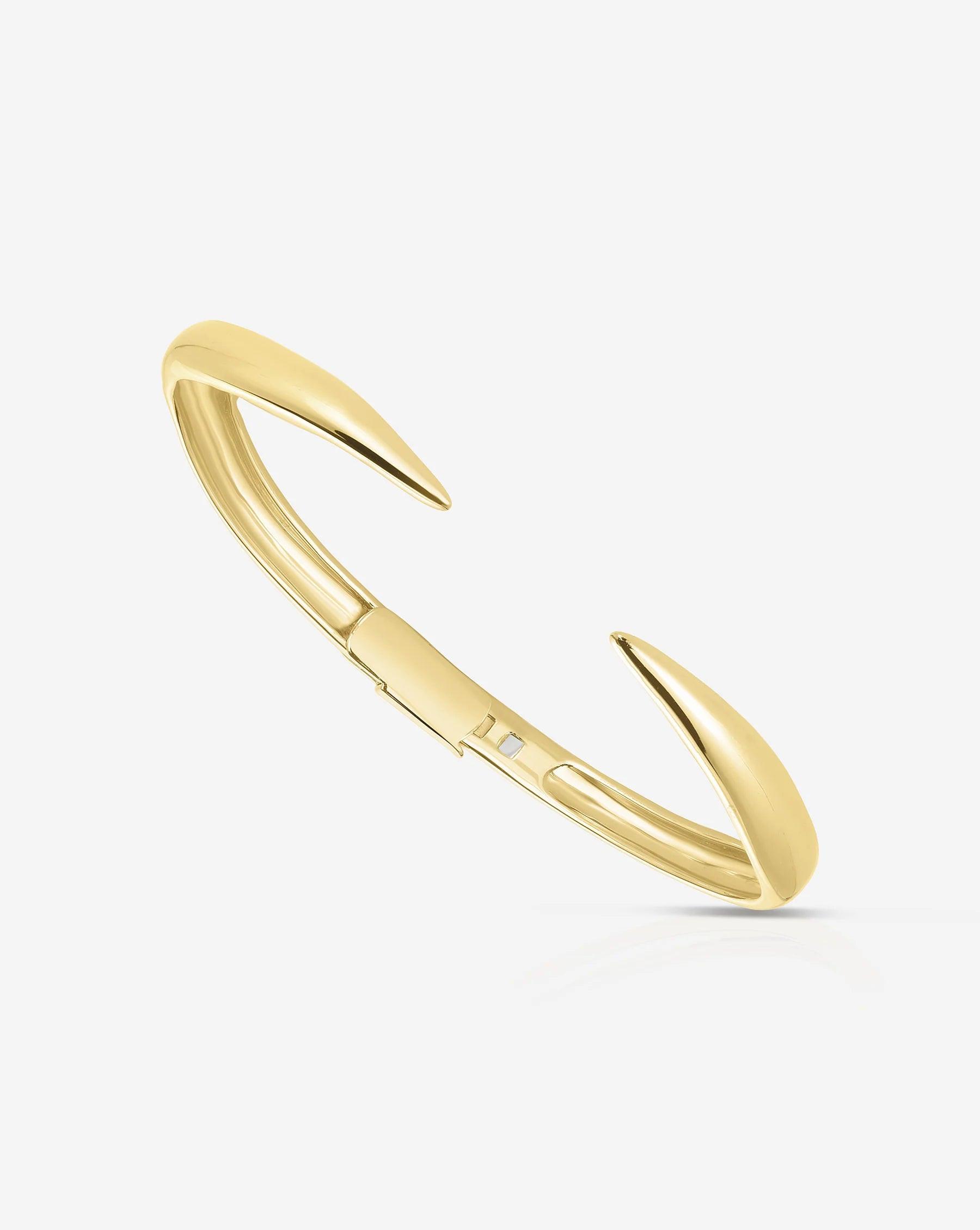 Elegant Gold Claw Cuff Bracelet – A Statement of Luxury.