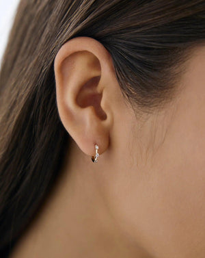 Sparkling Diamond Station Huggie Earrings - Elegant and Chic!.