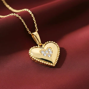 Elegant 14K Yellow Gold Heart Pendant Necklace Adorned with 0.15 Carats of Lab Diamonds.