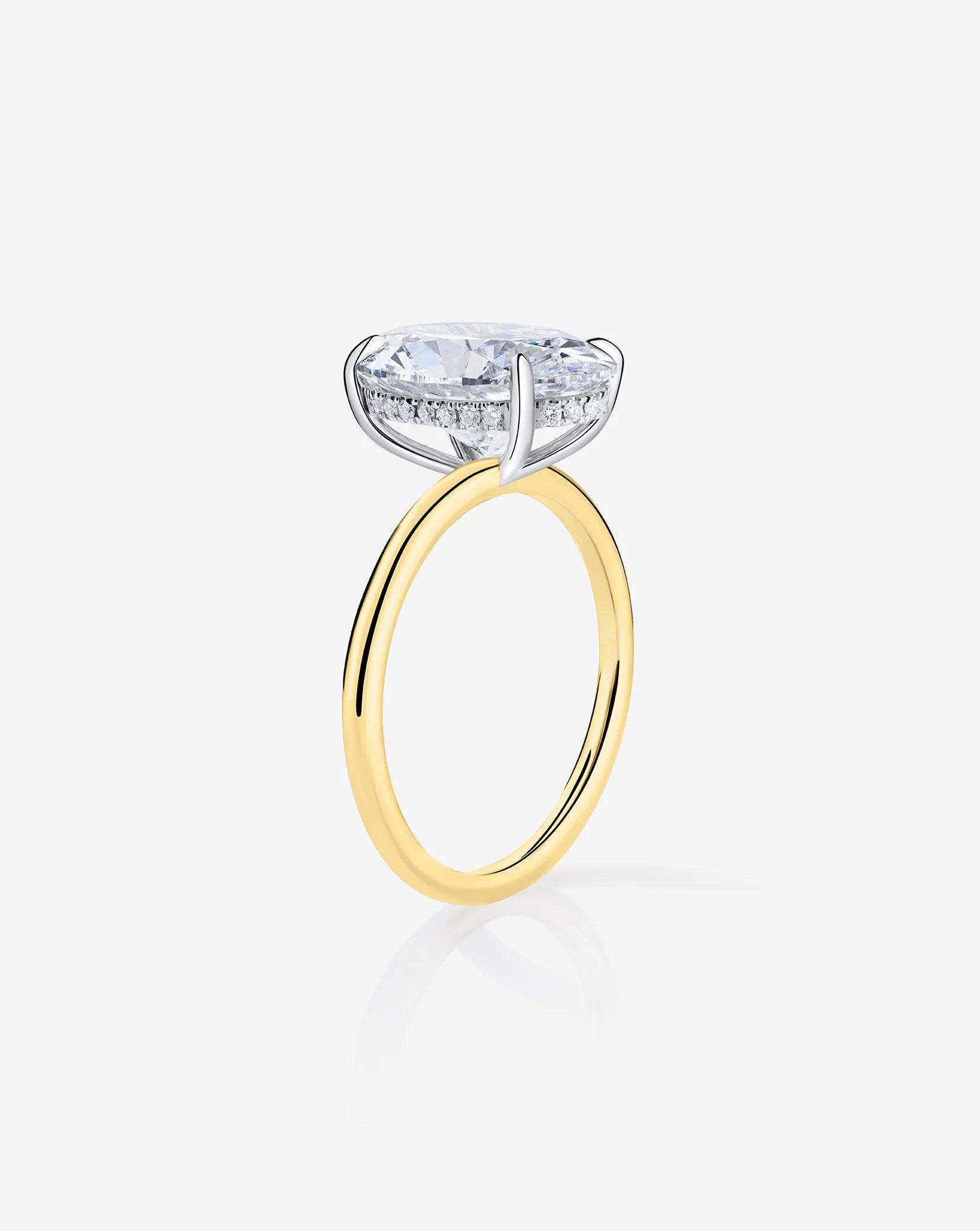Stunning 3.10 Carat Oval Lab Diamond with Whisper Thin® Hidden Halo Setting.