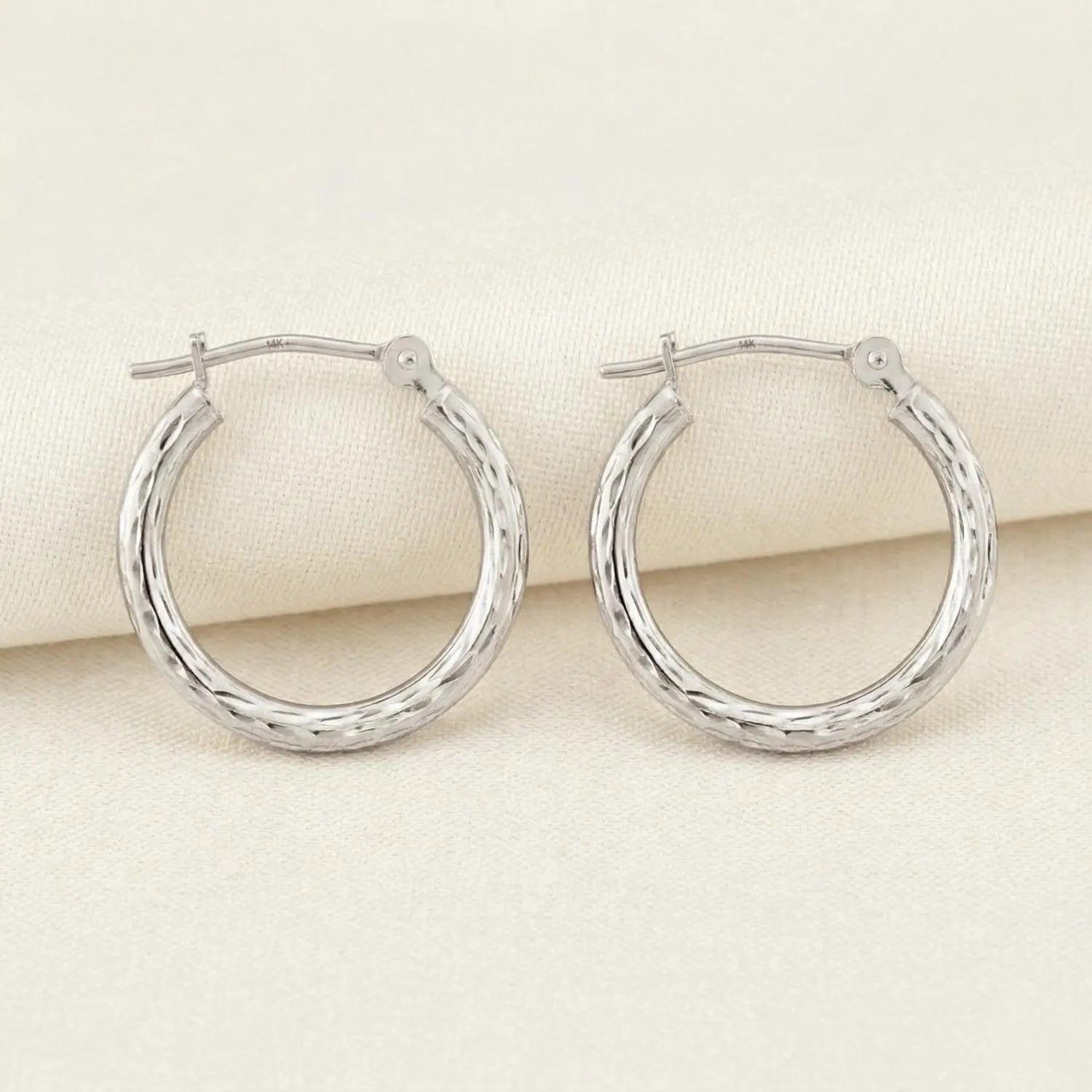 Stunning 10K White Gold Hand-Engraved Diamond-Cut Hoop Earrings - Crafted in the USA.