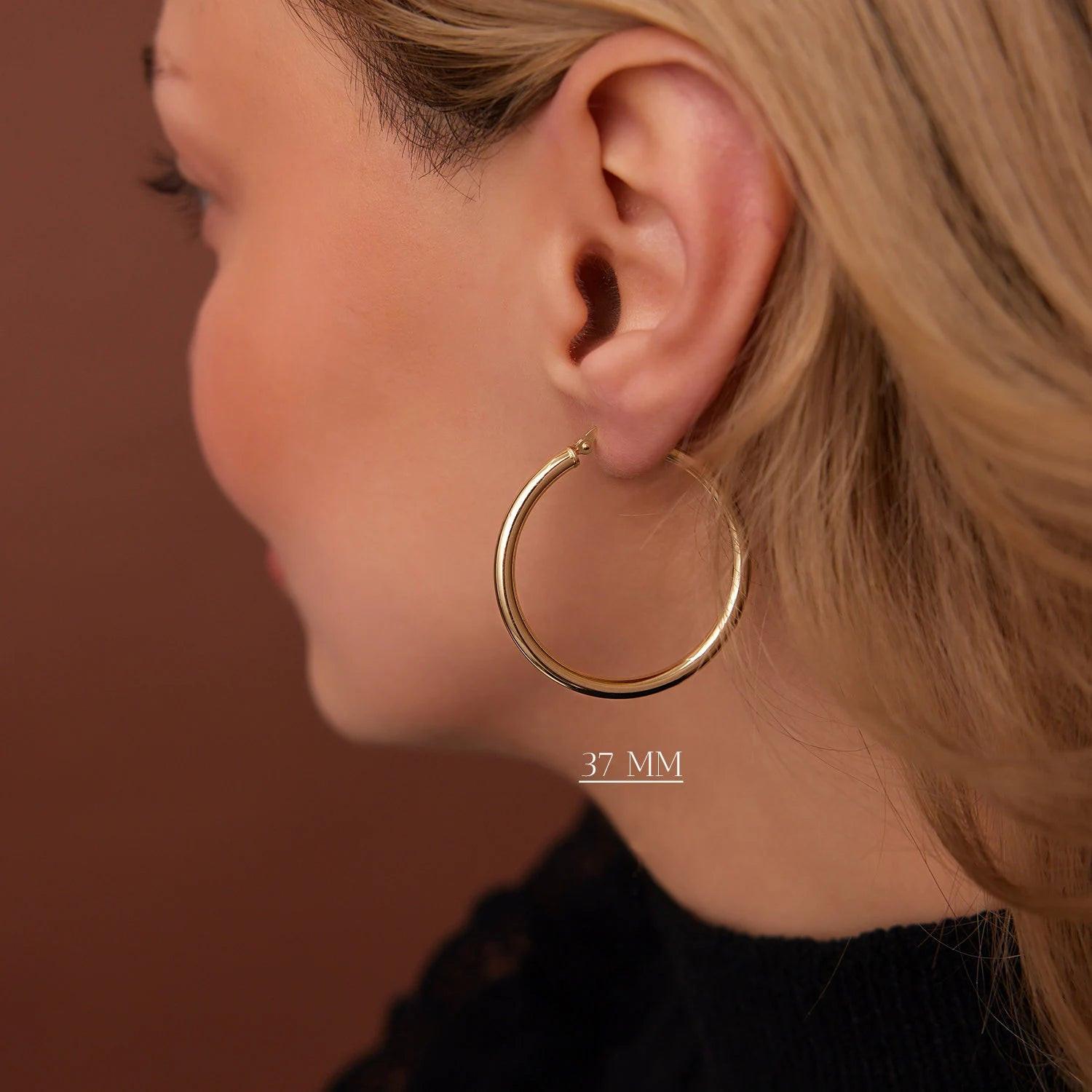 Luxurious 14K Gold Thick 3mm Waterproof Hoop Earrings for Everyday Elegance.