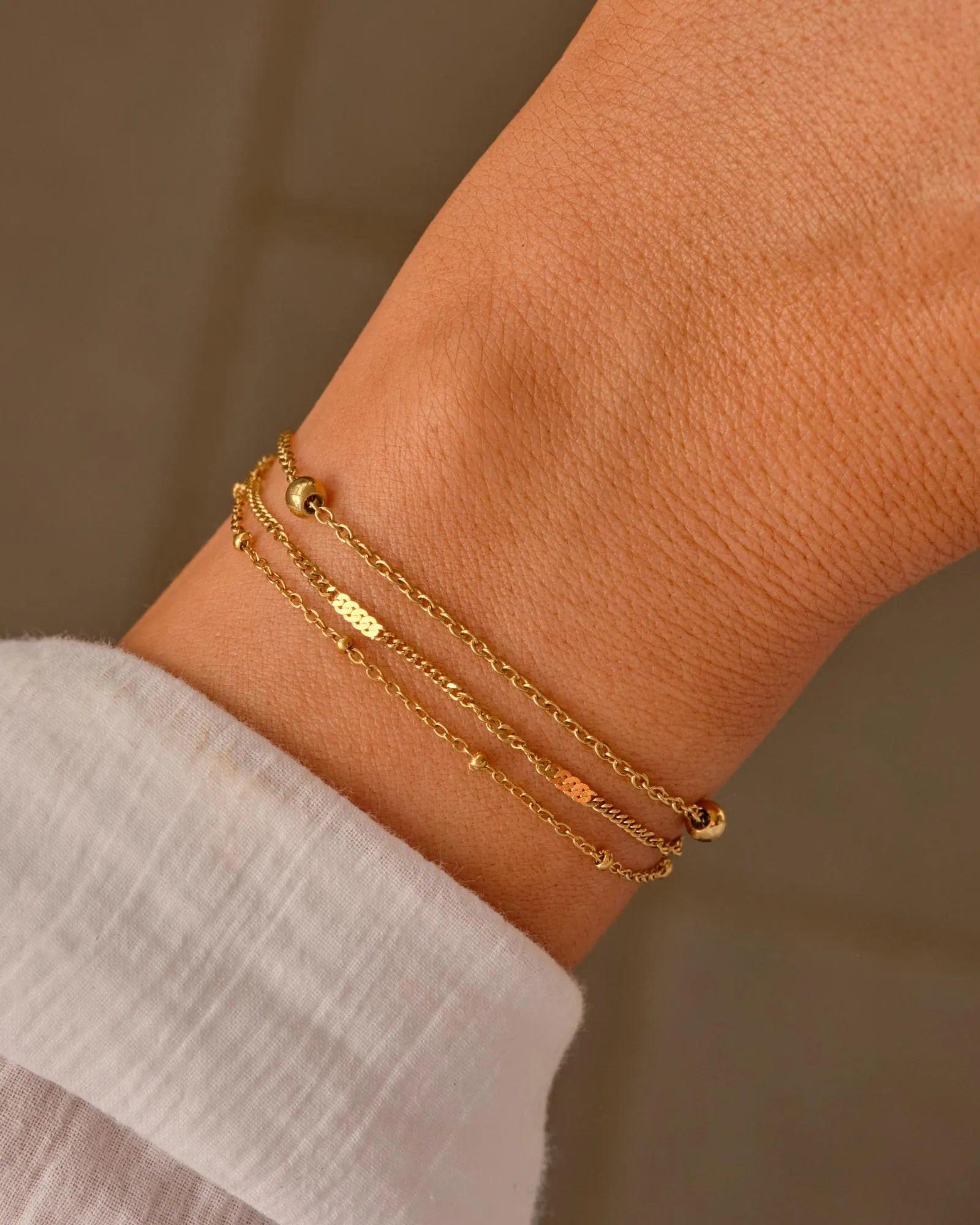 Elegant Waterproof Gold Stainless Steel Layered Bracelet - Dainty Stackable Design for Women.