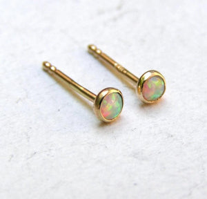 Dazzling 14K Yellow Gold Opal Stud Earrings - Adorable 3mm White Opal for Everyday Elegance and Special Occasions.