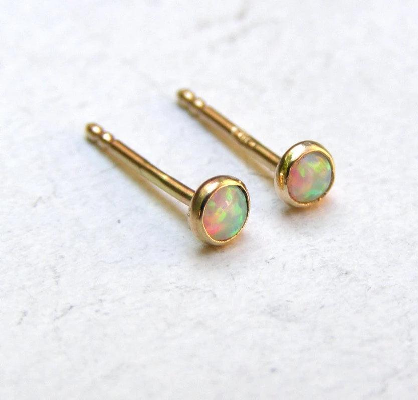 Dazzling 14K Yellow Gold Opal Stud Earrings - Adorable 3mm White Opal for Everyday Elegance and Special Occasions.