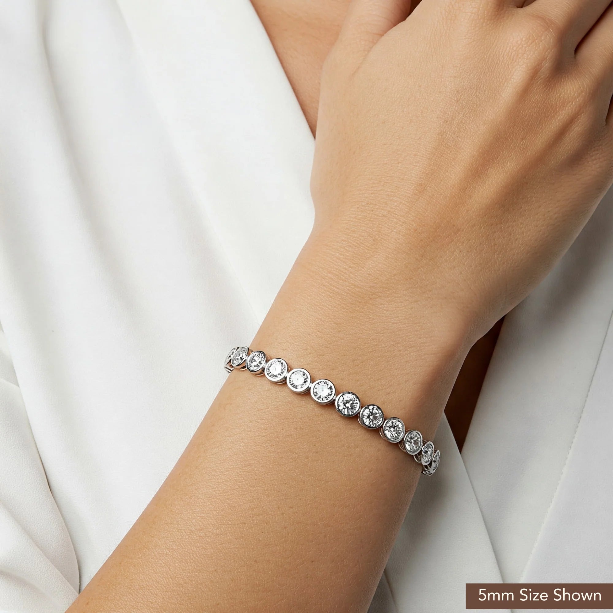 Sterling Silver Classic Bezel Set Simulated Diamond Tennis Bracelet, 7 Inch