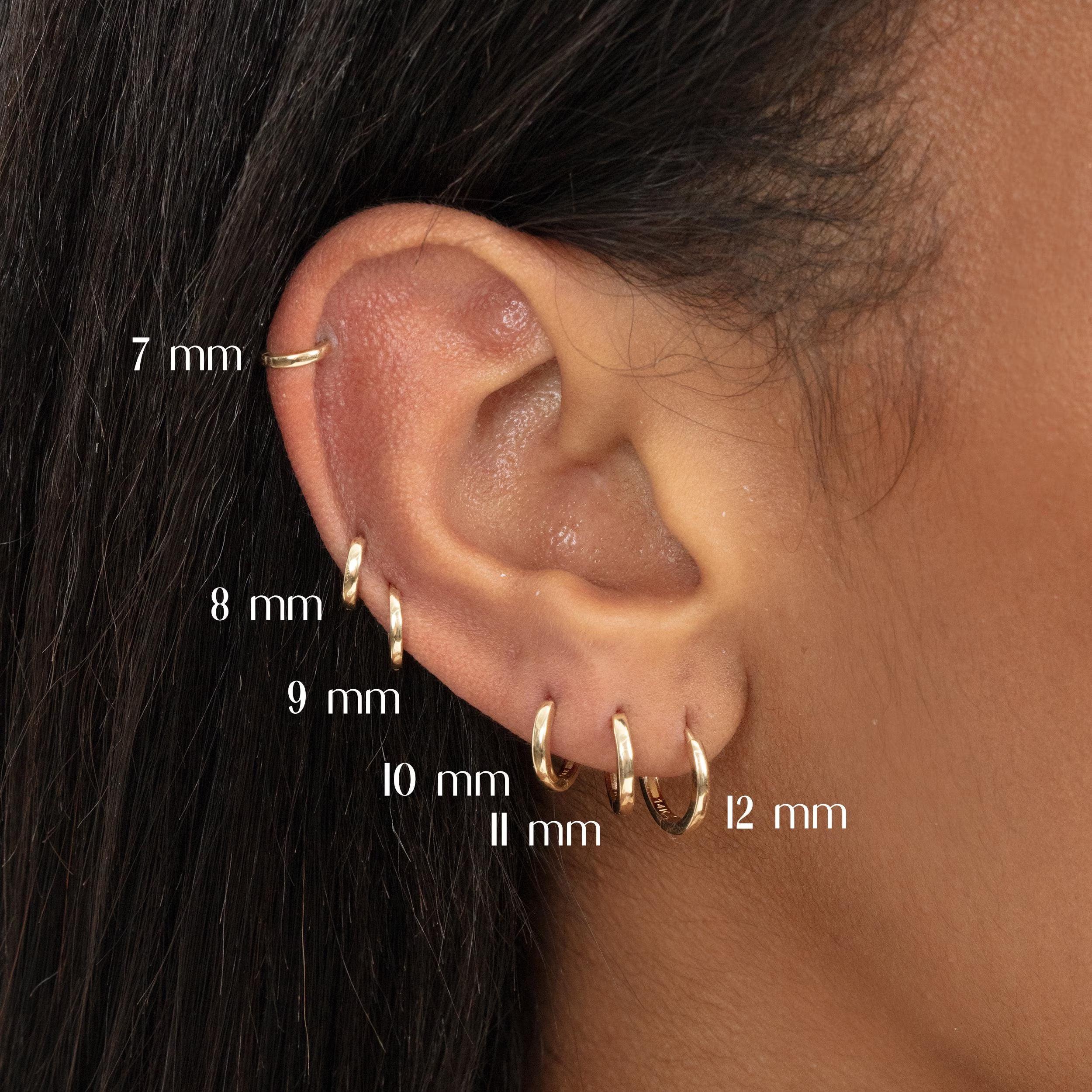 Elegant 14K Solid Gold Mini Huggie Earrings - Tiny Hinged Cartilage Hoops in 7mm, 8mm, and 9mm Sizes.