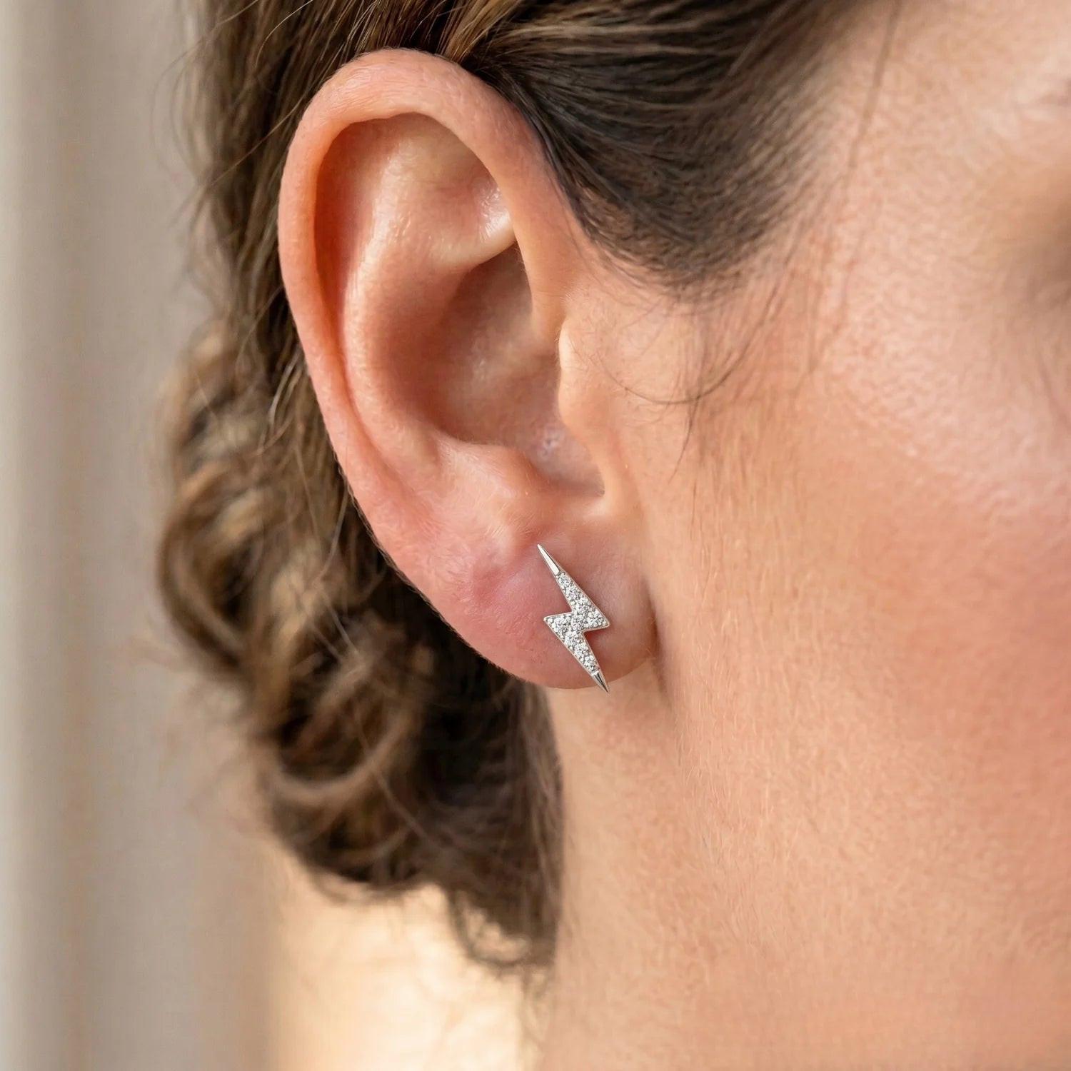 Sparkling Sterling Silver Lightning Bolt CZ Stud Earrings - Chic Pushback Design.