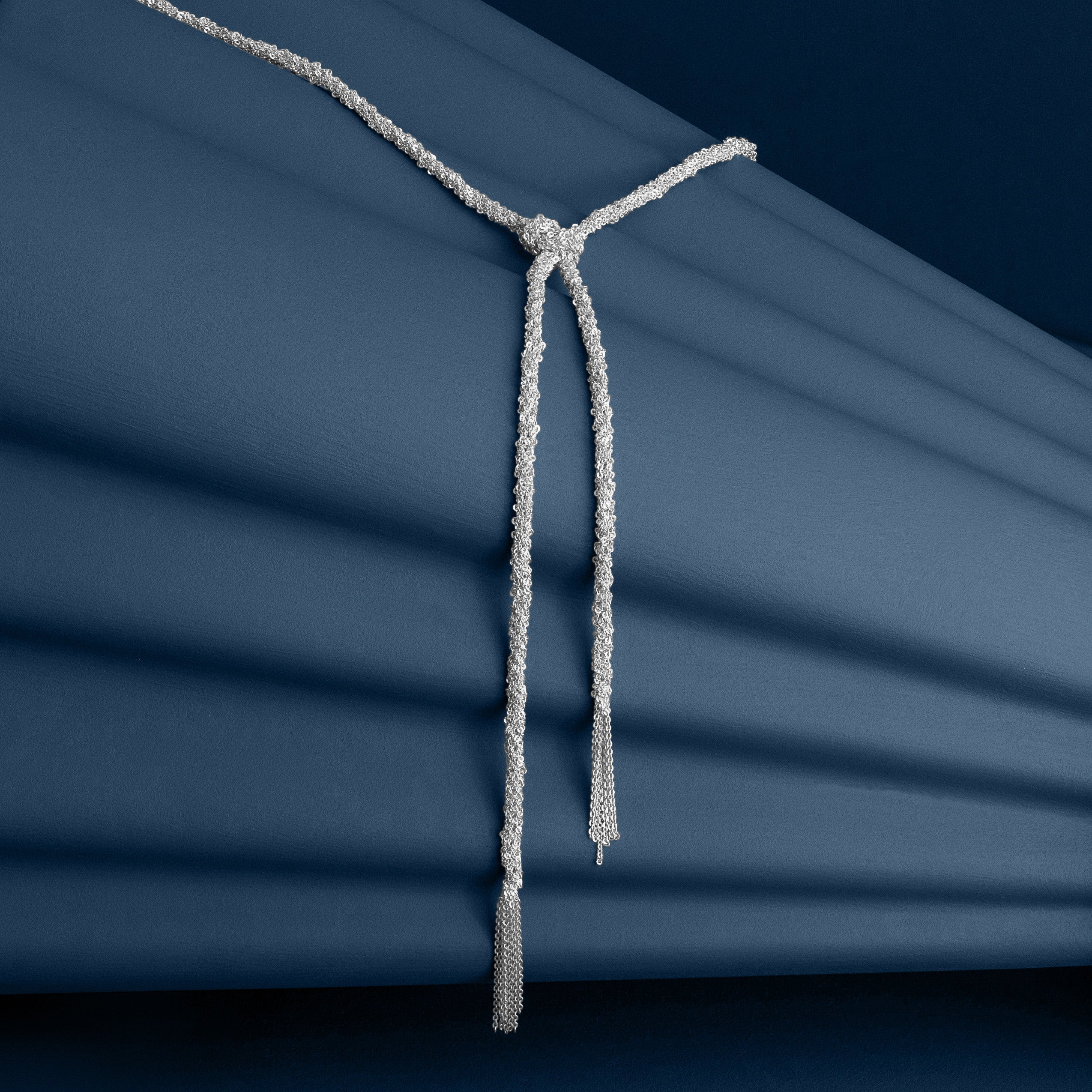SILVER WOVEN THREAD LARIAT KNOT NECKLACE