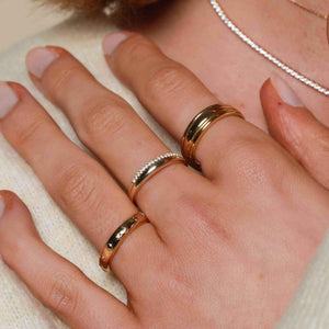 Stunning Solid Gold Topaz Eternity Ring - A Timeless Treasure.