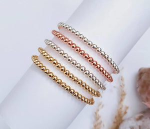 Elegant Gold Rose Silver Beaded Stacking Bracelets - 14K Gold Plated Elastic Design.