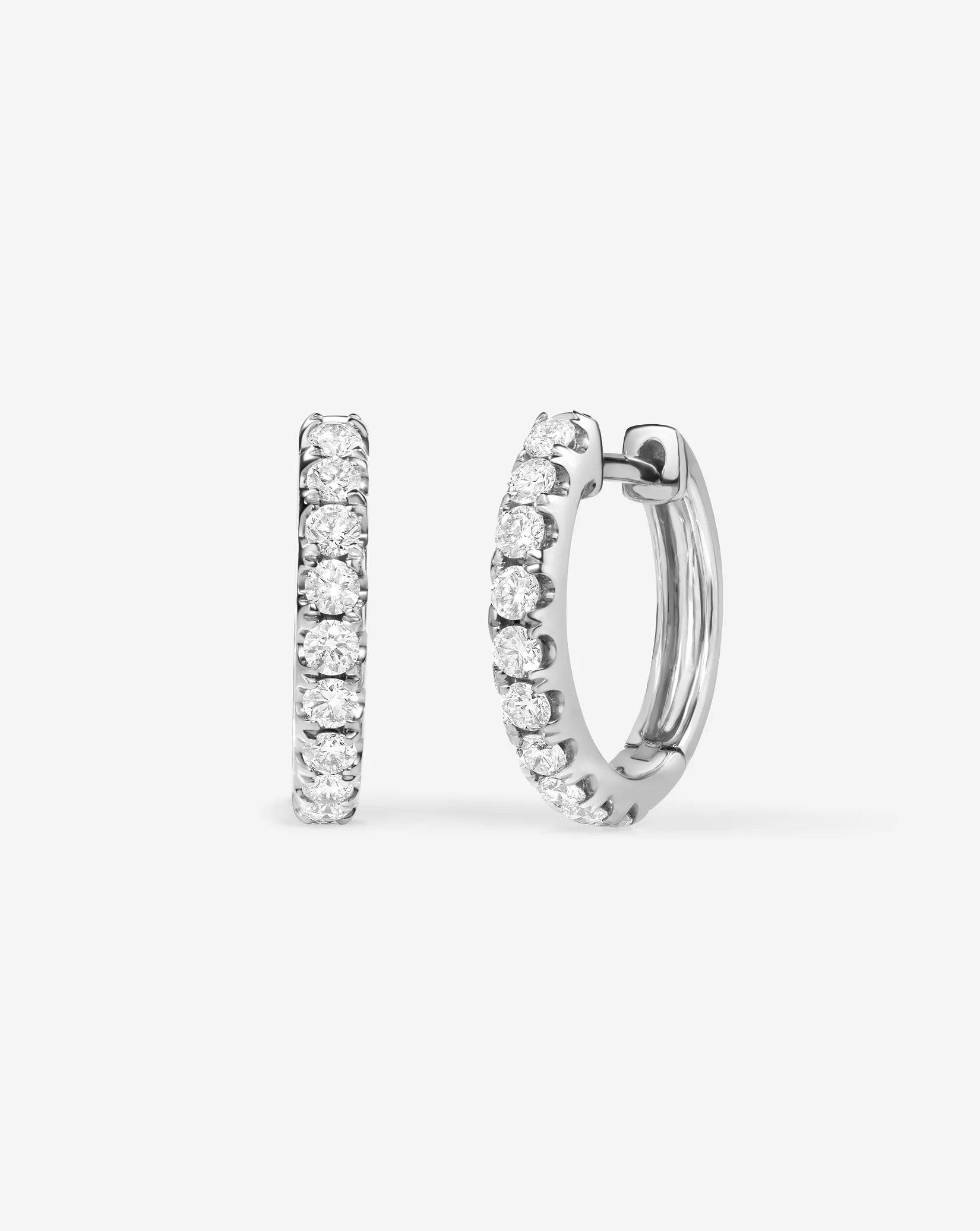 Glamorous Jumbo Diamond Huggie Earrings.