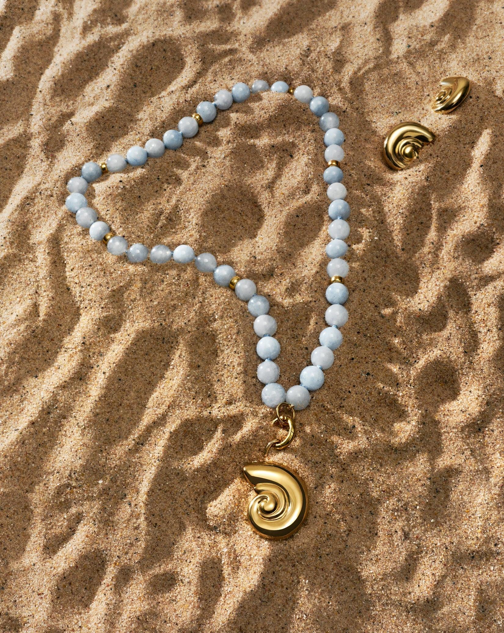 Stunning Nautilus Shell Pendant - Embrace Ocean Elegance.