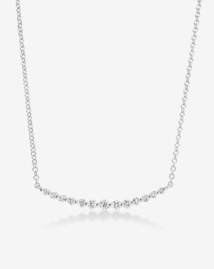 Exquisite Graduated Single Prong Diamond Necklace for Timeless Elegance.