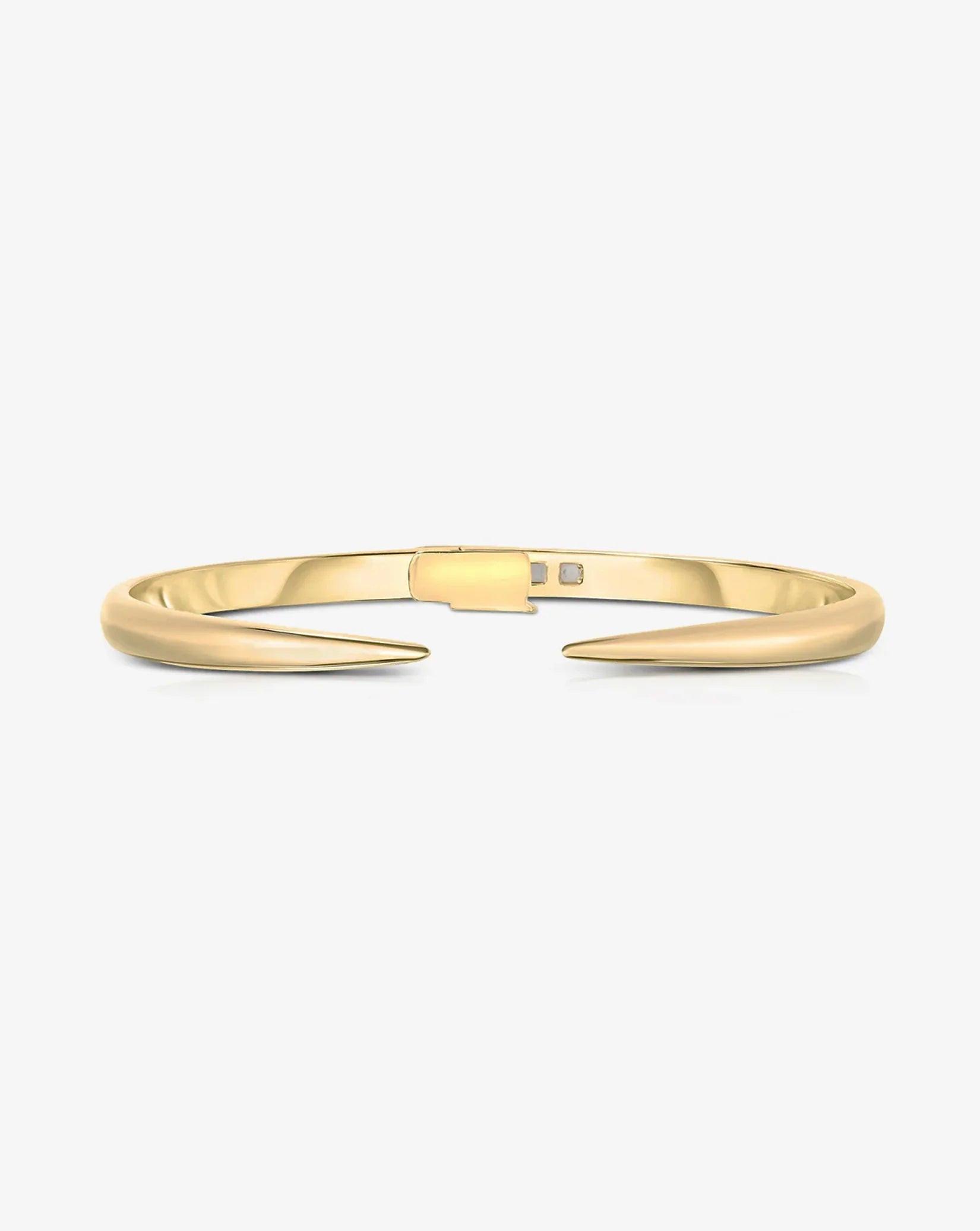 Elegant Gold Claw Cuff Bracelet – A Statement of Luxury.