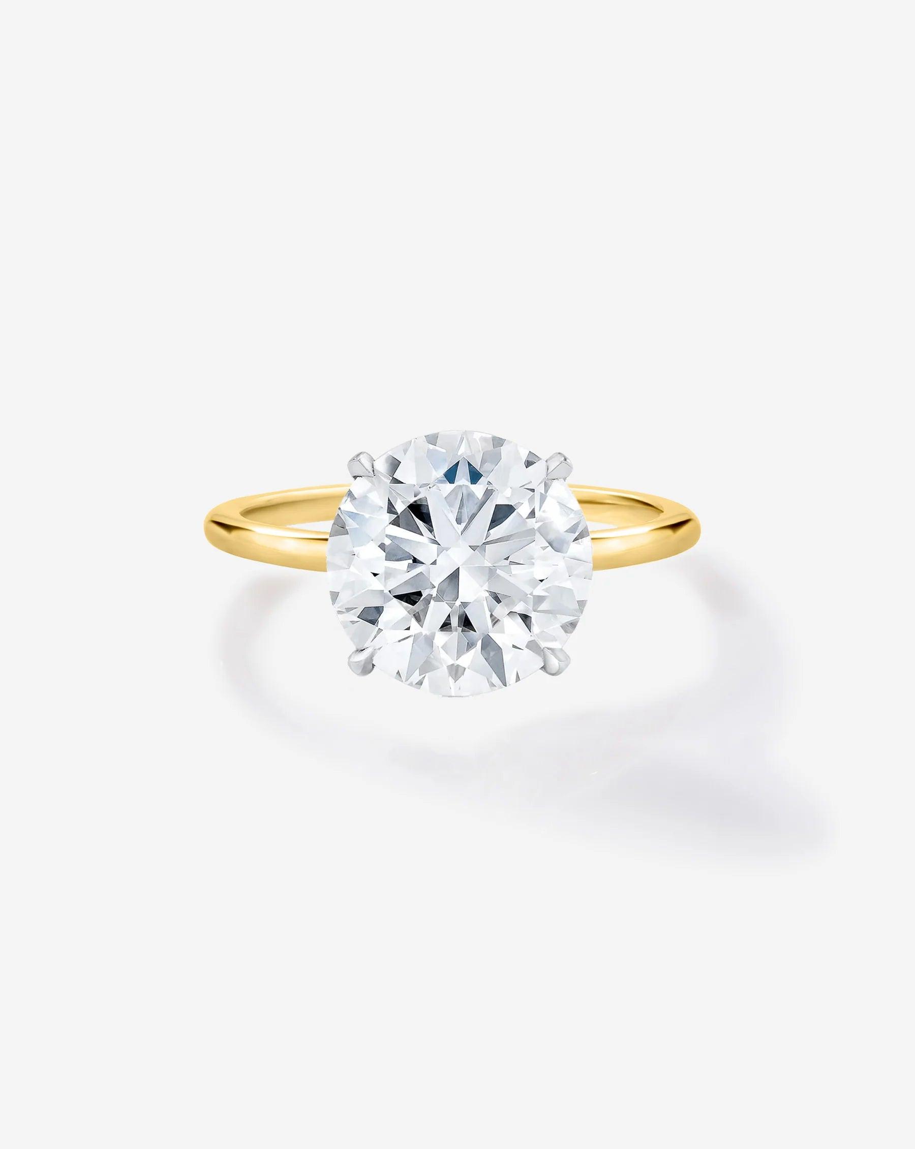 Stunning 4.11 Carat Lab Diamond with Whisper Thin® Hidden Halo.
