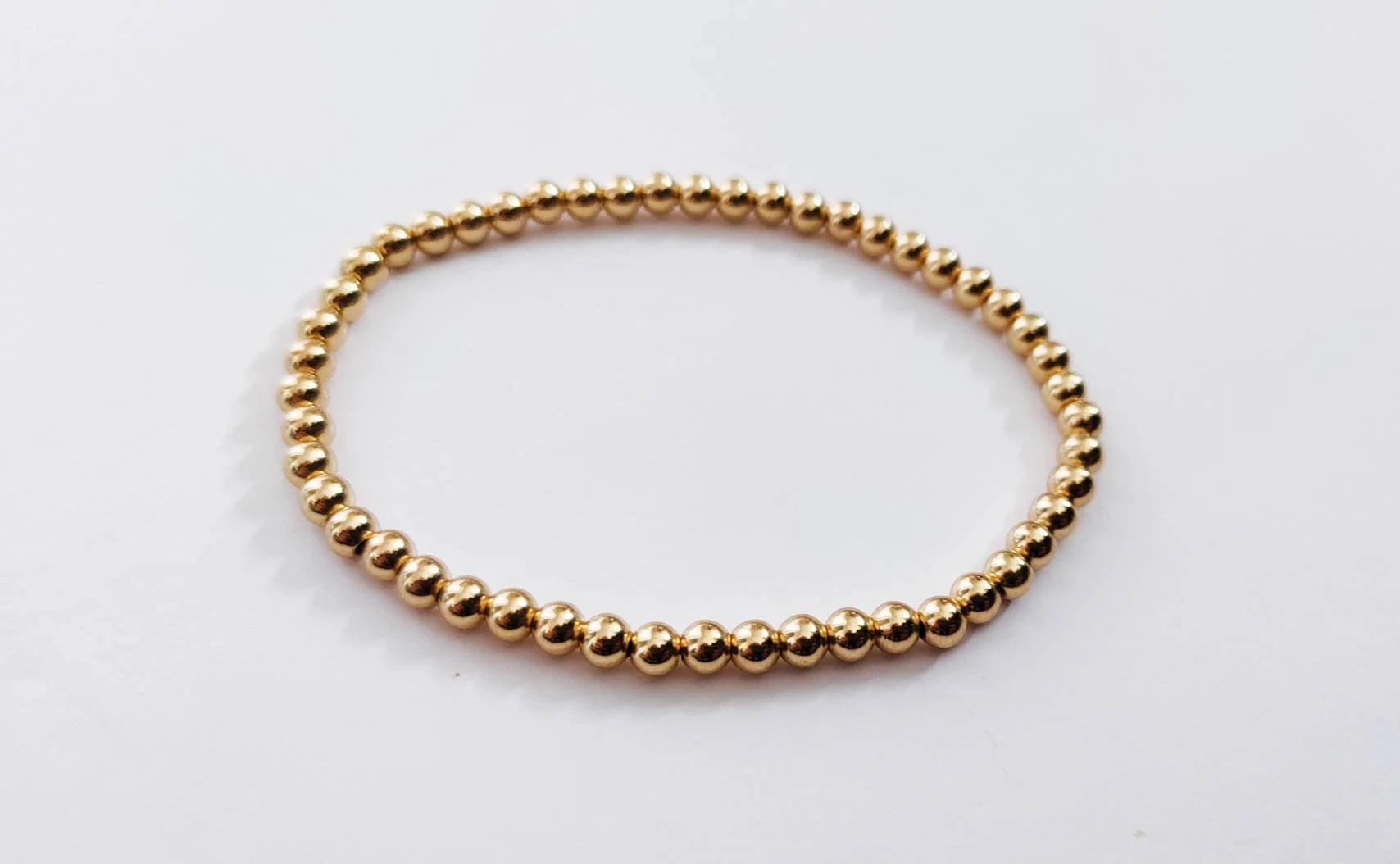 Elegant Gold Rose Silver Beaded Stacking Bracelets - 14K Gold Plated Elastic Design.