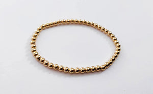 Elegant Gold Rose Silver Beaded Stacking Bracelets - 14K Gold Plated Elastic Design.