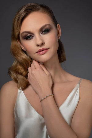 Elegant Gold Slider Bracelet with Dainty Pear-Shaped Cubic Zirconia for Women and Girls.