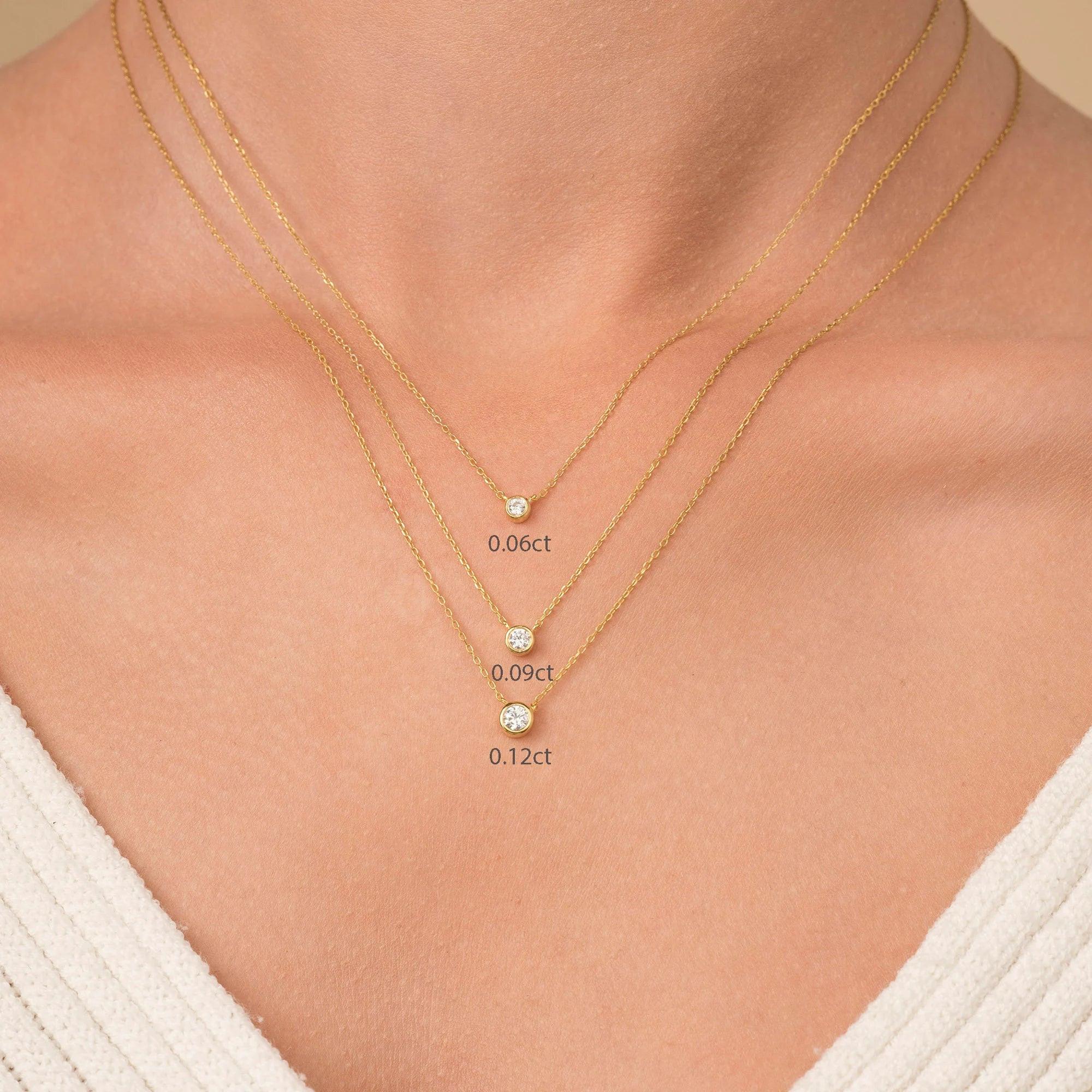 Elegant 14K Gold Diamond Solitaire Necklace - Minimalist Bezel Setting for Timeless Style.