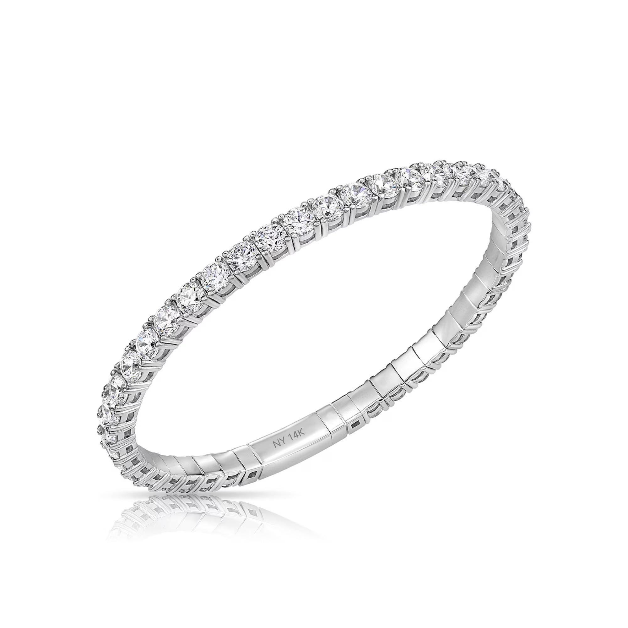 Elegant 14K Gold Sparkling Simulated Diamond Tennis Bracelet - Flexible Bangle Design.