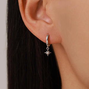 Dazzling 925 Sterling Silver Tiny CZ Starburst Huggie Hoop Earrings in Silver, Gold, or Rose Gold.