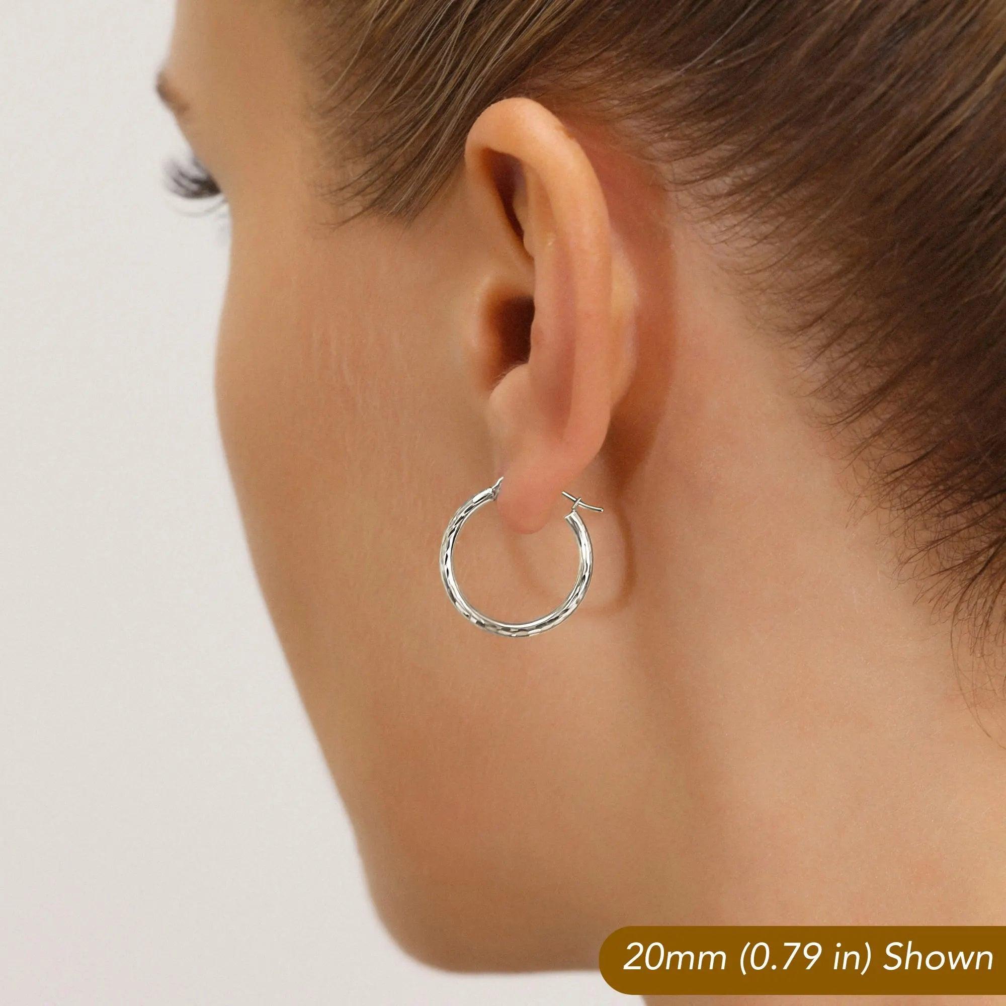 Stunning 10K White Gold Hand-Engraved Diamond-Cut Hoop Earrings - Crafted in the USA.