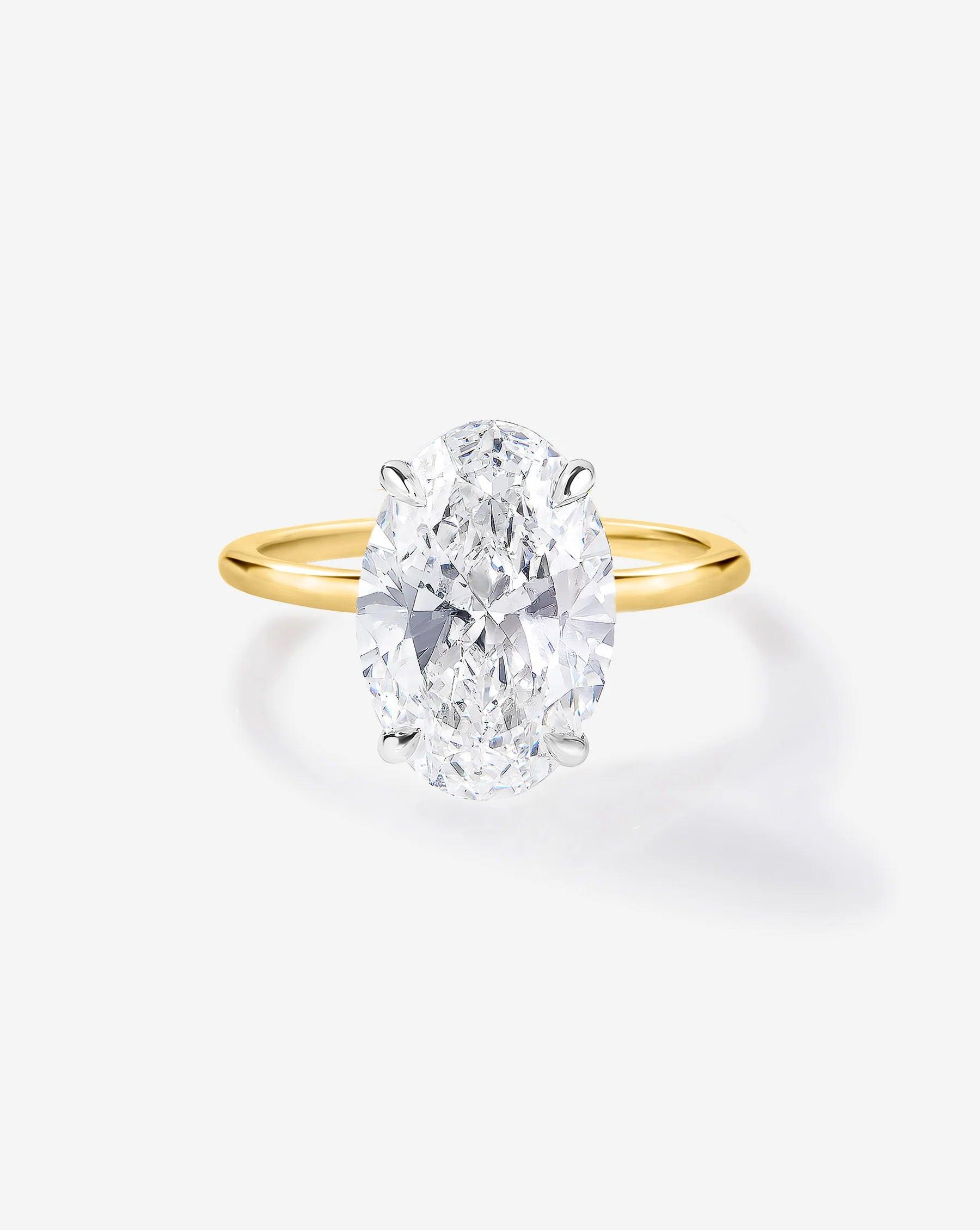 Stunning 3.28ct Oval Lab Diamond Engagement Ring in Ultra Thin 14K Gold Solitaire Setting.