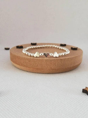 Charming Silver Heart Stretch Bracelet - Perfect Beaded Stacking Gift for Girlfriend or Teacher.