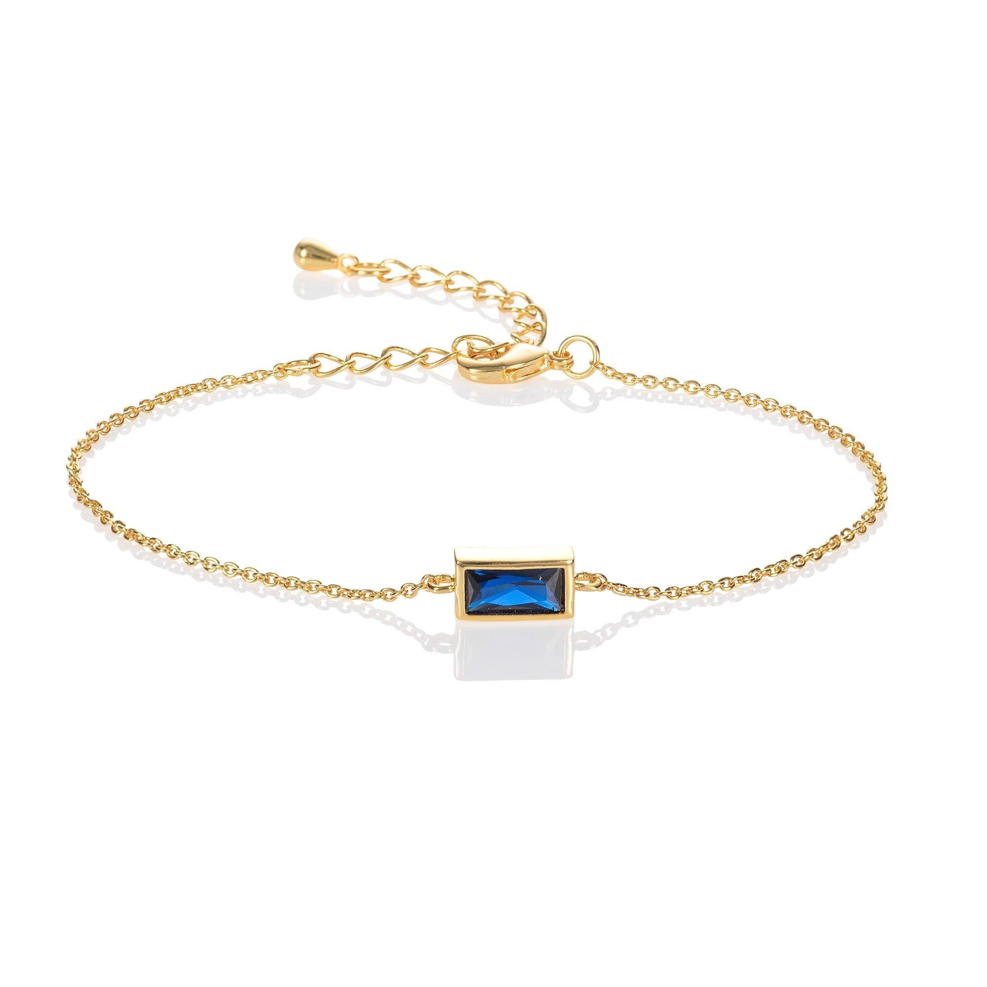 Elegant Adjustable Gold Plated Dainty Bracelet with Blue Stone for Women.