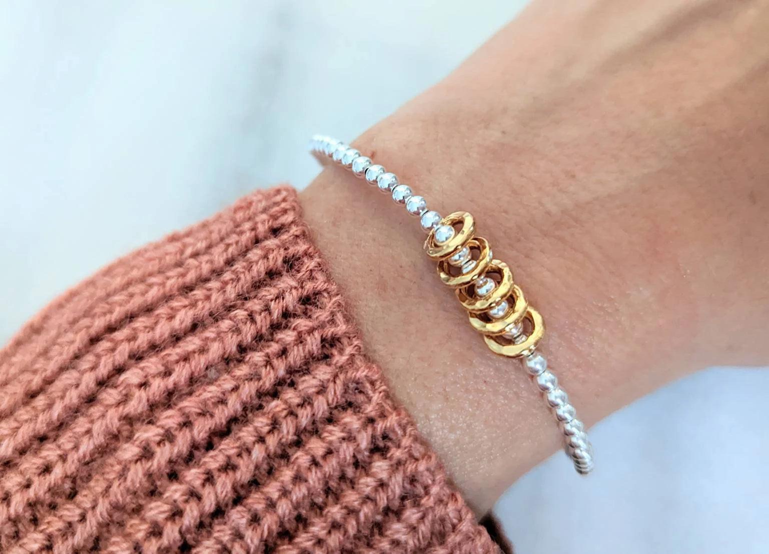 Sterling Silver Milestone Birthday Bracelet with Gold Decade Rings - A Custom Gift for Her.