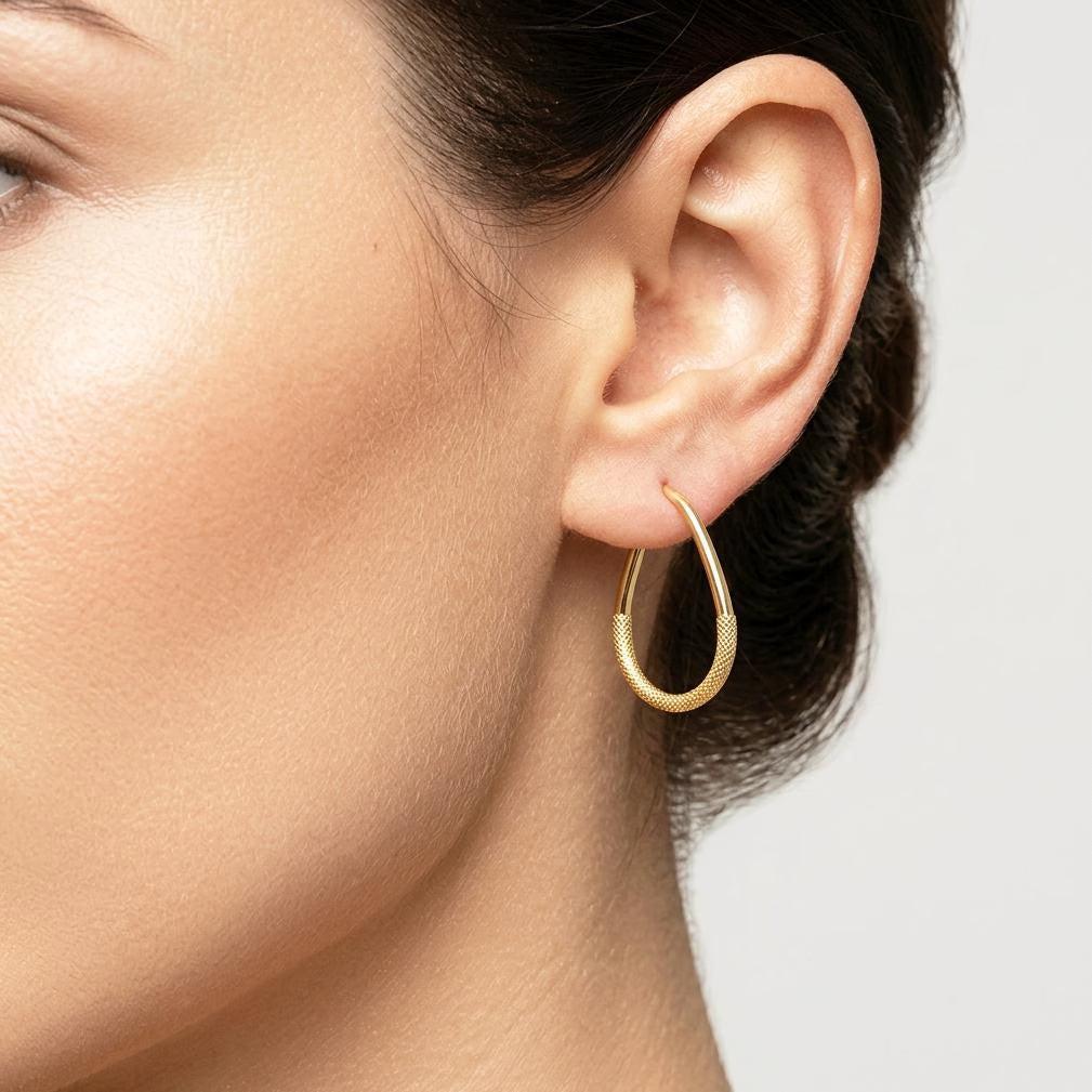 Elegant 10K Yellow Gold Textured Oval Hoop Earrings - Timeless Everyday Style.
