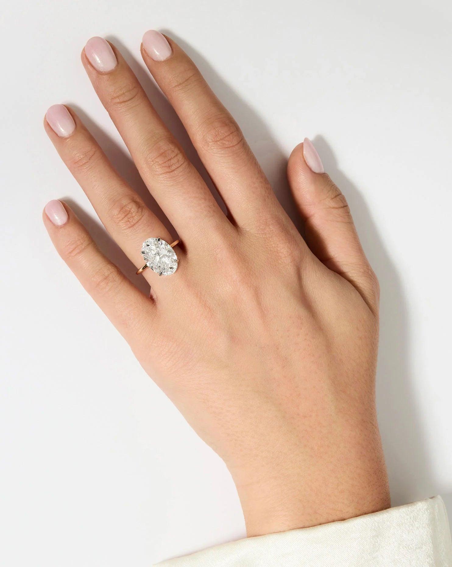 Exquisite 6.07 Carat Oval Lab Diamond in Whisper Thin® Setting.