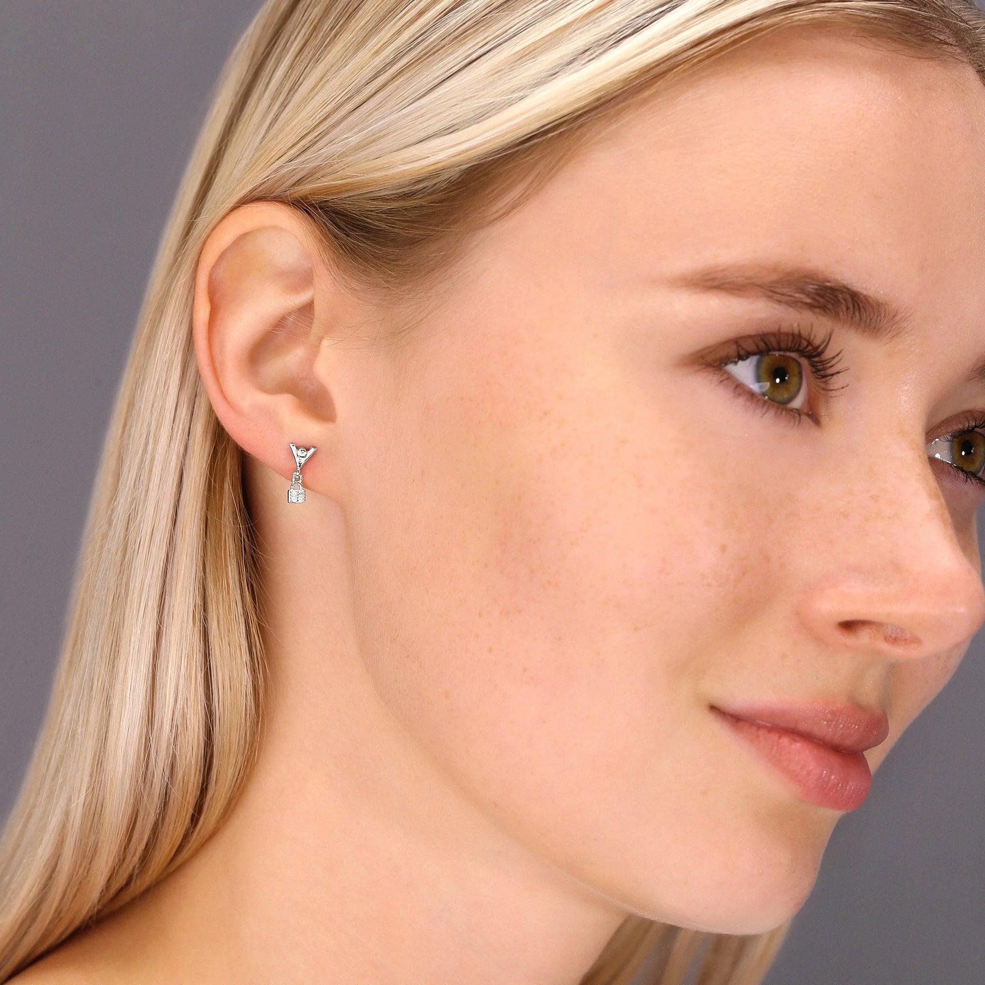 Elegant CZ Lock and Key Dangle Stud Earrings in Sterling Silver.