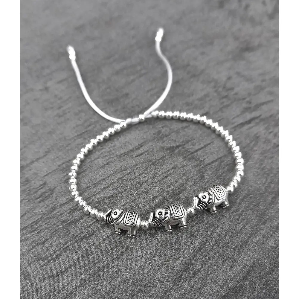 Charming Adjustable Lucky Elephant Bracelet & Anklet - Stylish Silver Bead Jewelry for Women & Girls.