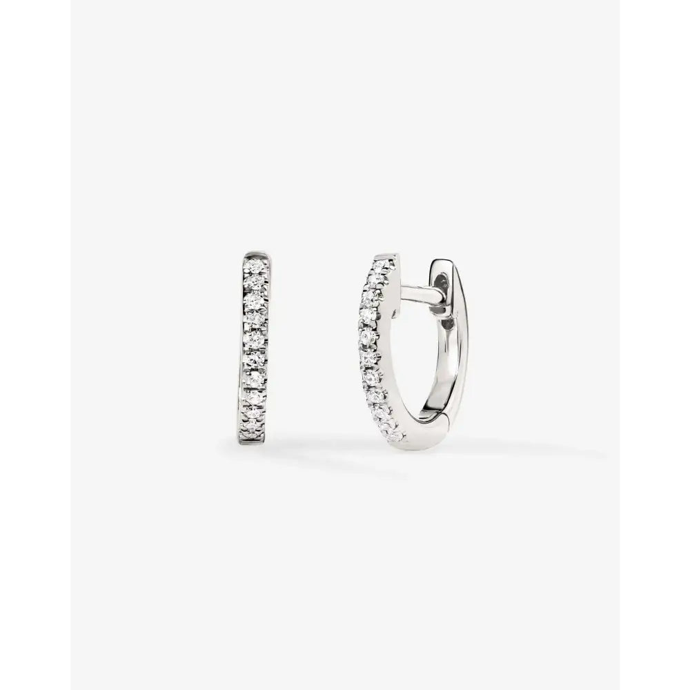Charming Petite Diamond Huggie Earrings.